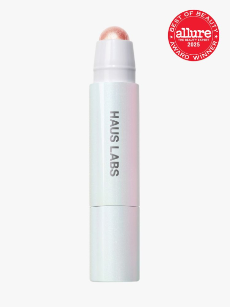Haus Labs Bio Radiant Glassy Highlighter Balm in branded holographic white pencil applicator on light gray background with red Allure Best of Beauty seal in the top right corner